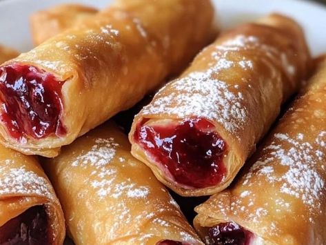 Pennsylvania's Cherry Cheesecake Egg Rolls: A Fusion of Flavors - NewsBreak Cherry Cheesecake Egg Roll Recipe, Cherry Cheesecake Egg Rolls, Lemon Creme Cake, Cheesecake Egg Rolls, Fried Cheese Bites, Cream Cheese Bars Recipe, Old Fashioned Chocolate Pie, Egg Roll Wrapper, Egg Roll Ingredients