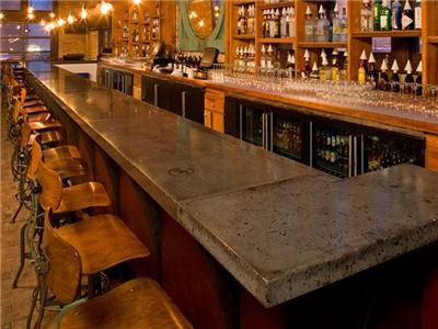 Concrete Countertops  Solid Concrete Tops  Milwaukee, WI    distressed concrete look... with the wood accents. Event Center Bar Design, Cement Bar Top, Taproom Ideas, Concrete Bar Top, Lake Bar, Stained Concrete Countertops, Outdoor Wood Bar, Cement Countertops, Brewery Ideas