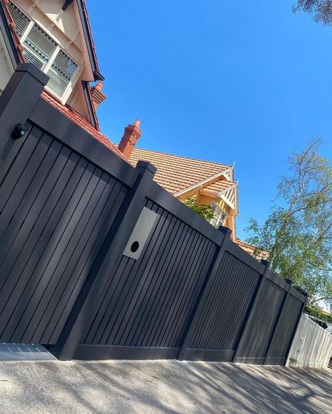 Black Timber Front Fence, Monument Fence Colour, Black Front Fence, Black Timber Fence, Veranda Balustrade, Monument Fence, Modern Picket Fence, Monument Exterior, Grey Fence Paint