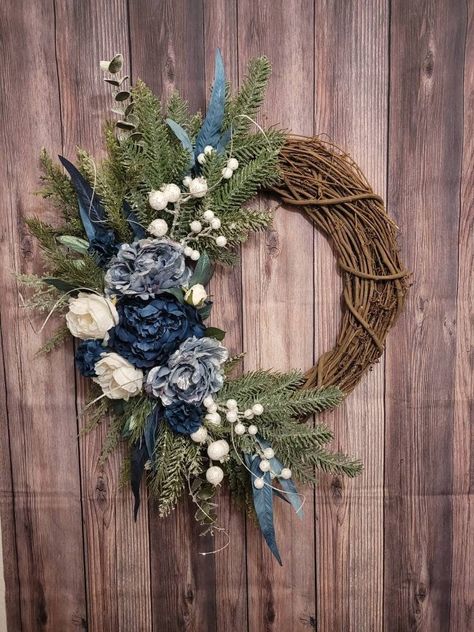 Handmade. Made to order. Tip to tip measurements: Height: 28" Width: 25" Depth: 6" - 8" Indoor or outdoor use This Elegant Blue and White Peony Rose Winter Christmas Wreath is the perfect statement piece for the front door, above your mantle, or the wall.   This wreath is handcrafted each time with care. No two are alike, but always created with the same amount of material and the same attention to detail, to create a one-of-a-kind masterpiece for you. It will take 1-3 days for it to be created and ready for shipping. Check out more wreaths on my full shop: https://www.etsy.com/shop/FlorasSecretGarden IMPORTANTDO NOT PLACE IN EXTREME HEAT The glue may melt. Please be aware that wreaths placed outdoors will weather or deteriorate over time from exposure to elements. The wreath should be hun Mantel Floral Arrangements, Front Door Blue, Pink Christmas Wreath, Floral Door Wreaths, White Christmas Wreath, Christmas Wreath For Front Door, Winter Wreaths, Door Wreaths Diy, Christmas Door Wreaths