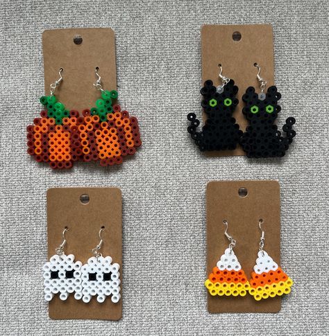 Halloween perler bead earrings - choose from pumpkins, black cats, ghosts or candy corn. Perler Bead Earrings, Halloween Perler, Perler Earrings, Minecraft Beads, Christmas Perler Beads, Hamma Beads Ideas, Seed Bead Jewelry Patterns, Easy Perler Beads Ideas, Perler Bead Templates