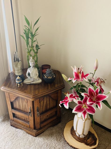 Corner table decor Corner Table Design Living Rooms, Living Room Corner Table Ideas, Buddha Corner In Living Room, Buddha Table Decor Ideas, Zen Table Decor, Buddha Corner Decor Living Room, Corner Table Decor Living Room, Buddha Corner Decor, Buddha Decor Living Room