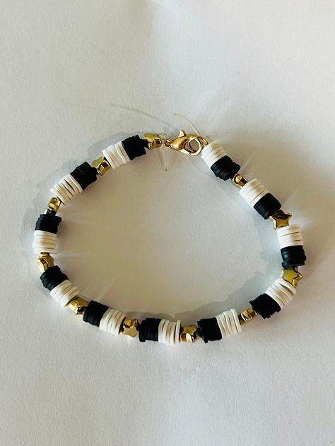 Custom, made to order clay beaded bracelet. Lengths for child and adults both available - message me for details. Personalization available. Clay Bead Bracelet Ideas Minimalist, Round Beaded Bracelets Ideas, Dark Clay Bead Bracelet, Clay Bead Bracelet Ideas Black And Gold, Basic Clay Bead Bracelet, Dark Green Clay Bead Bracelet, Soccer Clay Bead Bracelet, Cow Clay Bead Bracelet, Black And Gold Clay Bead Bracelet