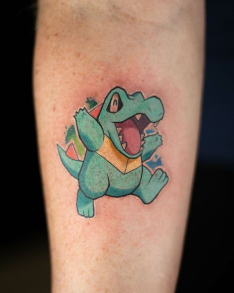 Totodile. Bit on the bleedy side, but aren't we all sometimes. Thanks Bryan! . . . #tattoo #totodiletattoo #pokemontattoo #gen2pokemon Totodile Tattoo, Dragonite Tattoo, Pokemon Tattoo, Tattoo Models, Future Tattoos, Tatting, Pokemon, Models, Tattoos