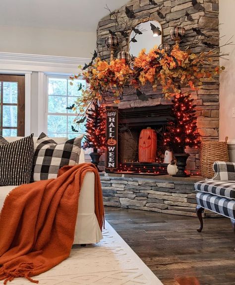 Farmhouse Charm 🏡 (@farmhouse.charm) posted on Instagram: “What’s the first thing in this picture that caught your eyes?💛🤍🧡 Follow us for more daily farmhouse inspiration ❤️ 📷 credit:…” • Oct 5, 2021 at 4:36pm UTC Decorating A Fireplace, Fireplace Fall Decor, Stone Fireplace Mantle, Fall Pumpkins Painting, Mantle Styling, Skirted Sofa, Halloween Fireplace, White Armchair, Fall Fireplace