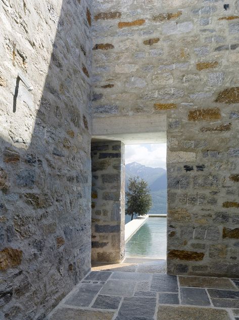 Through the opening and straight into the pool! Another great space.  Brione House / Wespi de Meuron Stone Building, Stone Architecture, Brick And Stone, Stone Houses, Stone House, Architecture Photography, Modern Architecture, Contemporary House, Interior Architecture