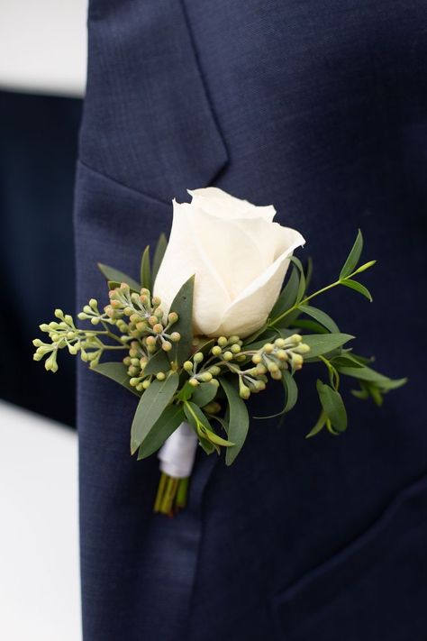 Men Corsage Wedding, Rose Bud Boutonniere, Boutinere Ideas Groomsmen White, Ivory Rose Boutonniere, White Rose Boutonniere Prom, Ivory And Green Boutonniere, Simple Spring Boutonniere, White And Green Wedding Boutineers, Mens Boutineers Wedding Eucalyptus