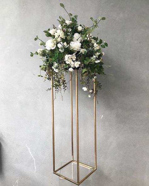 Simple, elegant centrepieces FOR HIRE Without the price tag! #weddingflorist #artificialweddingflowers #artificialflowers… Geometric Vase, Tall Wedding Centerpieces, Wedding Reception Backdrop, Geometric Vases, Wedding Painting, Wedding Floral Centerpieces, Artificial Flowers Wedding, Elegant Centerpieces, Metal Vase