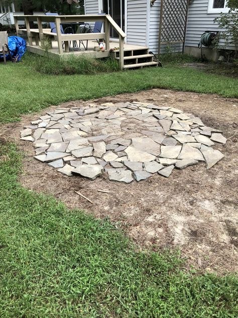 Need to dig the stones into the soil to make them even. Fire pit table on its way. House Rehab, Fire Pit Area, Fire Pit Table, The Soil, Fire Pit, Stepping Stones, Soil, Stone, Outdoor Decor