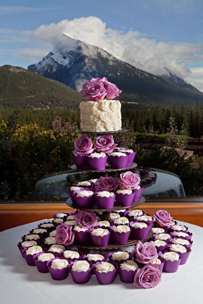 One small cake to cut for bride and groom and cupcakes (this would ALSO be a great Birthday Cake for a 16 year old girl and her friends - 3 more years for Gina and my skillz will be much better!!!) Mm Cupcakes, Lila Party, Purple Cupcakes, Cupcake Tower, Wedding Cakes With Cupcakes, Small Cake, Wedding Cupcakes, Fancy Cakes, Wedding Food