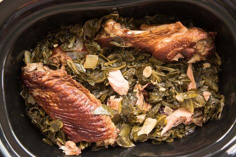 Leave your slow cooker to do all of the work with these Country-Style Slow Cooker Collard Greens with Smoked Turkey. Flavorful, tender, and so easy to make, this will be a favorite recipe to cook and eat. Freezer-friendly, too. Use smoked turkey or smoked pork. #collardgreens #smokedturkey #slowcookerrecipe #collardgreensrecipes #holidayrecipes #greensrecipe #holidaygreens #smokedhamhocks #smokedturkeywings #smokedturkeylegs #smokedneckbones #Thanksgivingrecipe #Christmasrecipe Paula Deen Collard Greens, Crock Pot Collard Greens, Crockpot Collard Greens, Cooking Collard Greens, Ham Hock Recipes, Southern Collard Greens, Smoked Turkey Wings, Smoked Turkey Legs, Collard Greens Recipe