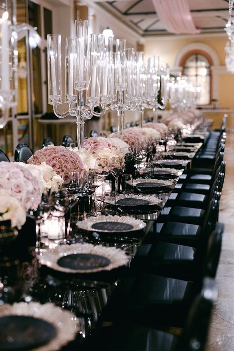 Long Black Tables with Pink Rose Centerpieces Black With Pink Wedding, Black And Light Pink Wedding Ideas, Table Set Ups For Parties, Blush Pink And Black Wedding Centerpieces, Wedding Color Combos Black, Blush Pink White And Black Wedding Reception Decoration, Pink Black And Silver Table Decor, Black White Gold Blush Wedding, Black White Pink Wedding Decor