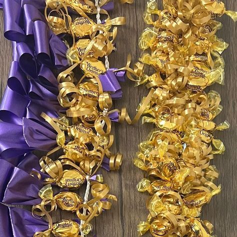 Make It Megan on Instagram: "✨New tutorial! Graduation season is here 🎓. Our new Youtube tutorial shows how to make 3 leis using hard candy 🍬 It is linked in our bio or check it out on our Youtube channel - Make It Megan 🌺♥️⁣ ⁣ ⁣ ⁣ ⁣ ⁣ ⁣ ⁣ ⁣ ⁣ ⁣ #candylei #graduationlei #graduationleis #candyleis #ribbonlei #ribbonleis #moneyleis #hawaiianleis #graduation2023" How To Make A Candy Lei, Candy Leis For Graduation, Graduation Candy Lei, Candy Lei, Ribbon Lei, Graduation Candy, Graduation Leis, Hawaiian Lei, Hard Candy