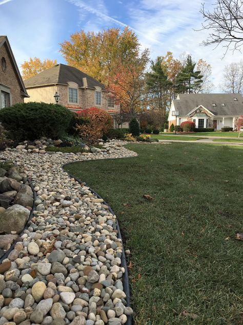 Added rock bed for a textured look to the landscape #dryriverbed #eggrock #frontlandscape #daphneysdesigns Egg Rock, Rock Yard, Rock Bed, River Bed, Front Landscaping, The Landscape, Front Yard, Egg, Yard