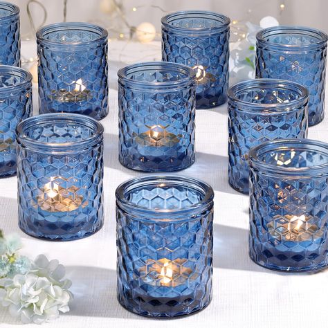 PRICES MAY VARY. Exquisite Appearance: HAVITI blue glass candle holder has a special geometric concave-convex design, which enables the tealight candle holders to reflect more light, making it sparkle when lit, creating a gorgeous and warm atmosphere for you,it is the best choice for your wedding decoration. Table Centerpiece Candle Holder: Our blue glass votive candle holder is perfect for gatherings and dining together decorations. They will sparkle as the centerpiece of your dining table and Blue Votive Candle Holders, Small Simple Wedding, White Wedding Table Decor, Candle Table Centerpieces, Bright Wedding Colors, Wedding Shower Party, Purple Beach, Tea Light Candle Holders, Blue Drinks