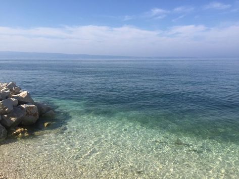 The clearest water laps the stony shore in Podstrana, Croatia Clear Water, Croatia, Water