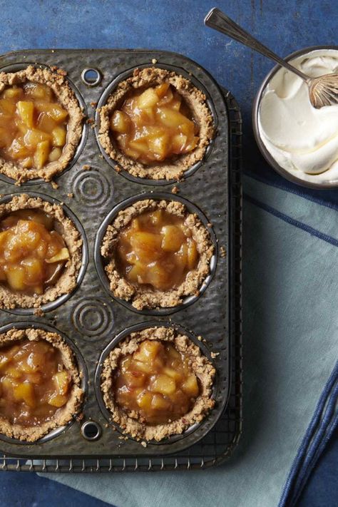 These delectable single-serving tarts are gluten-free and sweetened with dates instead of refined added sugars. Top with a little unsweetened whipped cream to take this special—yet healthy—dessert to the next level. #thanksgiving #thanksgivingrecipes #bestthanksgivingrecipes #thanksgivingdesserts #healthyrecipes Mini Apple Pie Recipe, Peach Mango Smoothie, Pizza Sugar Cookie, Mini Pie Recipes, Mango Smoothie Bowl, Almond Smoothie, Mini Pie, Mini Apple Pies, Diet Desserts