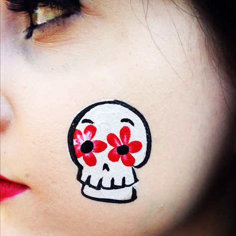 Face painting: Looks like Dia de los Muertos Easy Face Painting Designs Halloween, Sugar Skull Face Paint Easy, Halloween Cheek Art, Face Paint Skull, Face Painting Halloween Kids, Skull Face Tattoo, Easy Halloween Face Painting, Sugar Skull Face Paint, Festival Face Paint