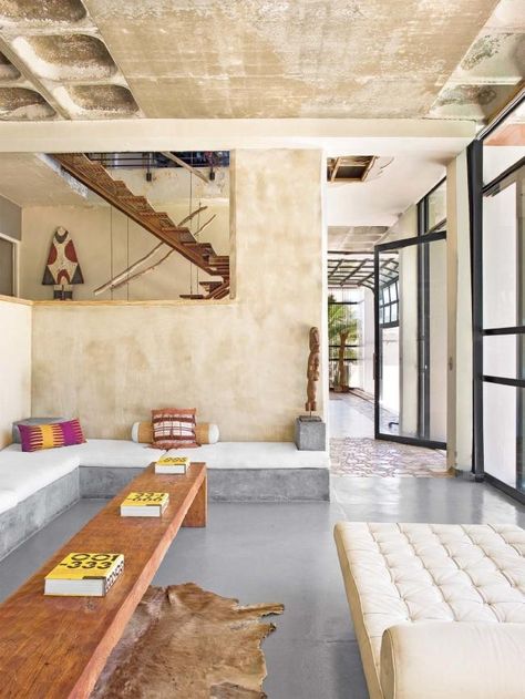 Mezzanine Floor Design, Concrete Sofa, South African Homes, African Interior Design, Cow Skin Rug, African Home, African Interior, Rugs Australia, Vogue Living