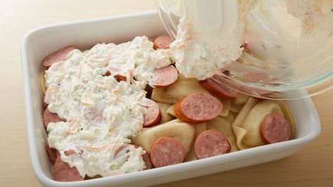 Pierogi Casserole Recipe - Pillsbury.com Pierogi Casserole, Pierogi Recipe, Yummy Casseroles, Kielbasa, Glass Baking Dish, Polish Recipes, Ultimate Comfort Food, Casserole Recipe, Cheese Sauce