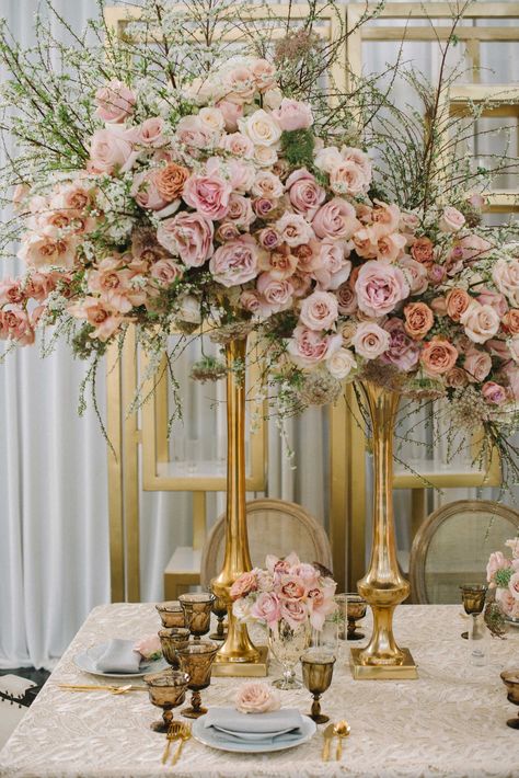 Tall Blush Floral Centerpiece, Gold Vase  Photography: Krista Mason Photography Read More: http://www.insideweddings.com/weddings/romantic-victorian-inspired-tablescape-featuring-classic-colors/810/ Gold Candlestick Centerpiece, Tall Flower Arrangements, Gold Centerpieces, Wedding Reception Centerpieces, Reception Centerpieces, Tall Flowers, Sophisticated Bride, Wedding Inside, Gold Vases