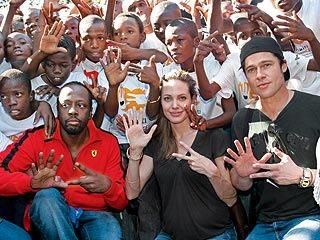 Angelina and brad Angelina Jolie Charity, Brad And Angie, Wyclef Jean, Angelina Jolie Style, Brad And Angelina, Super Couple, Angelina Jolie Photos, Humanitarian Work, Business Woman Successful