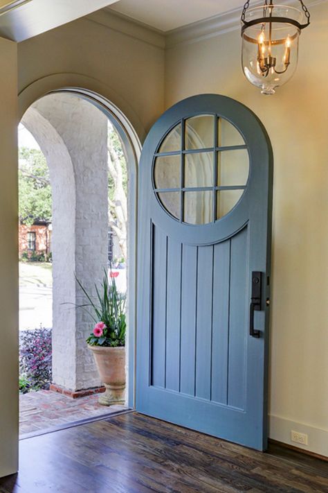 This round top door is the perfect addition to a craftsman home. Would you replace your current front door with one like this? French Blue House Exterior, European Door Designs, Ranch Interior, Single Entry Doors, Cottage Vibes, Blue Front Door, European Doors, Rustic Traditional, Arched Doors