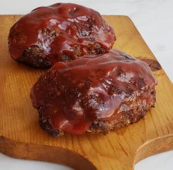 This easy recipe for Best Air Fryer Meatloaf is topped with a tangy sauce and makes two small loaves with secret ingredient to prevent them from being dry. It is easily halved if you just need one. If you don't have an air fryer, no worries. I give you oven directions, too! Recipes In Air Fryer, Air Fryer Meatloaf, Honey Bbq Chicken Wings, Moist Meatloaf, Honey Bbq Chicken, The Slow Roasted Italian, Ground Sirloin, Best Air Fryer, Air Fryer Oven Recipes