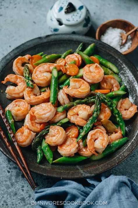 A quick and easy shrimp and asparagus stir fry featuring juicy shrimp and crisp asparagus brought together with a traditional Chinese white sauce and fragrant aromatics. It is perfect for dinner during a busy week. Asparagus Shrimp Recipes, Chinese White Sauce, Crisp Asparagus, Asparagus Stir Fry, Juicy Shrimp, Shrimp And Asparagus, Easy Shrimp, White Sauce, Shrimp Recipes