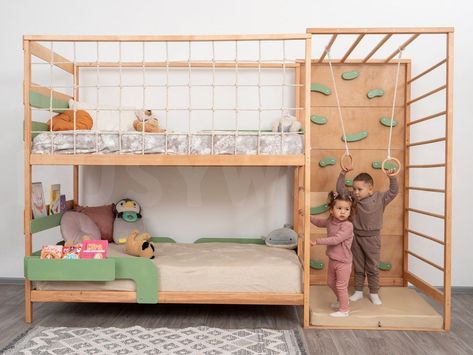 Montessori Bed for Twins 🌟 #toddlergames #toddlers #toddlertoys #firstbirthday #firstbirthdayideas #nurserydecor #nursery #babyroom #babyroomdesign #kidsroom #toddlerroom #montessory #woodentoys #firstbirthdayparty #kidsofinstagram #playroomdecor #woodentoys #imagineplay #playroomdecor #playroomdesign #toddlerapproved #activitiesforkids #education #stemforkids Boy Toddler Room Ideas, Bed For Twins, 3 Tier Bunk Beds, Loft Net, Luxury Baby Room, Diy Toddler Bed, Toddler Gym, House Beds For Kids, Montessori Bed