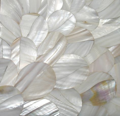 Pearl plumage. We adore the captivating feather-like effect of this gorgeous mother-of-pearl inlay. ⁠ ⁠ This finish can be used across in a variety of settings, from draw-fronts and doors in joinery and would look particularly elegant in a bathroom or master bedroom suite. ⁠ ⁠ #fameedkhalique #luxurymaterials Mother Of Pearl Bathroom, Pearls Aesthetic, Murmuration Art, Pearl Aesthetic, Pale Aesthetic, Mother Of Pearl Inlay, Lifestyle Accessories, Wedding Photo Booth, Pearl Inlay