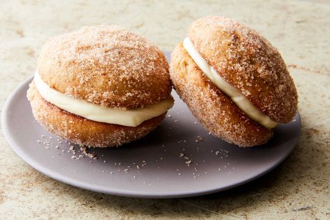 Their name may be fun to say, but whoopie pies aren’t really pies at all but rather soft, cakelike cookie sandwiches These are inspired by a classic apple cider doughnut and, true to form, are dusted with cinnamon sugar Apple cider that's been reduced and a bit of apple butter work in tandem to subtly flavor the fluffy cakes, and good old cream cheese frosting makes the ideal filling Apple Cider Doughnut Whoopie Pies, Apple Cider Donut Whoopie Pie Recipe, Apple Cinnamon Whoopie Pies, Apple Cider Donut Whoopie Pies, Apple Butter Whoopie Pies, Apple Pie Whoopie Pies, Caramel Apple Whoopie Pies, Cinnamon Whoopie Pies, Apple Cider Whoopie Pie Recipe