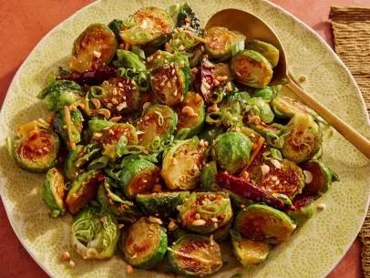 Kung Pao Brussels Sprouts Recipe | Food Network Kitchen | Food Network Kung Pao Brussel Sprouts, Healthy Thanksgiving Sides, Healthy Thanksgiving Recipes, Sichuan China, Sichuan Pepper, Healthy Thanksgiving, Brussels Sprouts Recipe, Thanksgiving Holiday, The Sauce