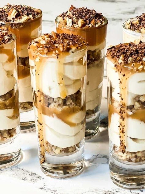 The Best No Bake Salted Caramel Cheesecake Shooters | Keto Caramel Cheesecake Shooters, No Bake Salted Caramel Cheesecake, New Year's Eve Food, Dessert Shooters Recipes, Cheesecake Shooters, Shooter Recipes, Dessert Shooters, New Years Eve Food, Salted Caramel Cheesecake