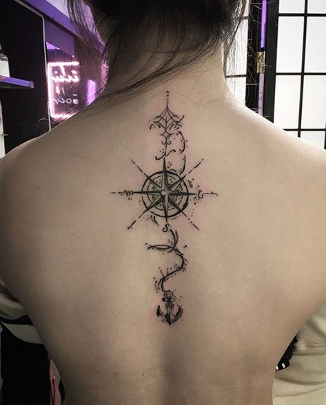 318 Of The Best Spine Tattoo Ideas Ever Compass Tattoo Spine, Nautical Spine Tattoo, Spine Tattoos For Women Compass Tat, Compass Spine Tattoo, Compass Back Tattoo, Spine Tattoos For Women Ocean Theme, Viking Rune Spine Tattoo, Spine Tattoos Of Spine Bone, January Tattoo