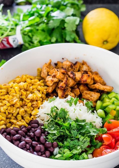 Mexican Chicken and Rice Salad - a fresh summer salad loaded with black beans, chicken, corn and rice. Totally addicting and makes the perfect dinner for a busy weeknight. Chicken Corn And Rice, Chicken And Rice Salad, Black Beans Chicken, Chicken Rice Beans, Corn And Rice, Mexican Chicken Salads, Mexican Chicken And Rice, Rice Salad Recipes, Rice And Beans Recipe