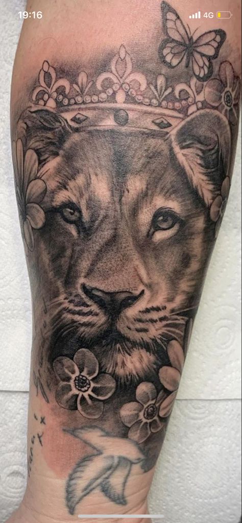 Beautiful lioness tattoo. Butterflies, flowers, tattoo. Cross Lion Tattoos For Women, Lioness Back Tattoo Women, Feminine Lioness Tattoo For Women, Half Lioness Half Flower Tattoo, Queen Lioness Tattoo, Half Lioness Tattoo, Lioness Tattoo For Women Half Sleeves, Lioness With Flowers Tattoo, Butterflies Flowers Tattoo