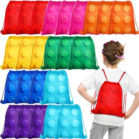 PRICES MAY VARY. Building Block Party Favor Bag: you will have 24 drawstring brick block bags, a total of 8 colors, red, blue, green, yellow, orange, purple, pink, light blue, 3 for each color, to meet the needs of building blocks themed parties, and they can also be applied as prizes for school games and activities Quality and Reusable: these building blocks birthday bags are made of density polyester material, safe, lightweight, but sturdy and strong, will not tear or break easily; The designs Lego Friends Birthday, Lego Themed Party, Unique Party Themes, Ninjago Birthday, Bags For Kids, Birthday Bag, Lego Birthday Party, Lego Birthday, Kids Party Themes