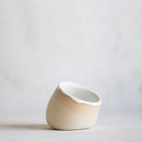 This open-top ceramic salt cellar holds a generous amount of sea salt and sits on a gentle pivot for convenient access. The exterior has been left raw to appreciate the raw beauty of this buff stoneware, and the interior has been glazed with a soft white satin glaze. KINDLY NOTE: Variations in glaze color, size, and finish are to be expected, this adds to the charm! approximate size: 3.5" wide, 2.5" tall dishwasher-safe, although we recommend handwashing to extend the life of your tumbler each p Pottery Salt Cellar, Ceramic Salt Dish, Brooms And Brushes, Pottery Inspo, Ceramic Accessory, Ceramics Inspiration, Hand Building, Scandinavian Ceramic, Kitchen Display