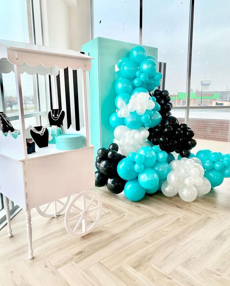 Loved doing this Breakfast at Tiffany’s Inspired setup for my beautiful baby girl, that is now 14 years old (I still can’t believe it). 🥹 Hope you all love this setup as much as we do🩵🖤🤍 SWIPE LEFT!!! Please Like, Share, Comment! . . . . Full Setup + Concept & Styling: @feteicons Balloon Decor: @feteicons Backdrop Props: @feteicons Bubble House: @feteicons Table Setting Design: @feteicons Treat Cart: @feteicons Cake: #buttercreamfete @2sweet1975 Venue: @thegeorgetownloft . . . #feteicons ... Tiffany Blue Balloons, Breakfast At Tiffanys Backdrop Ideas, Tiffany And Co Theme Party Balloons, Tiffany And Co Ballon Garland, Treat Cart, Backdrop Props, Breakfast At Tiffany’s Balloon Arch, Table Setting Design, Tiffany Theme