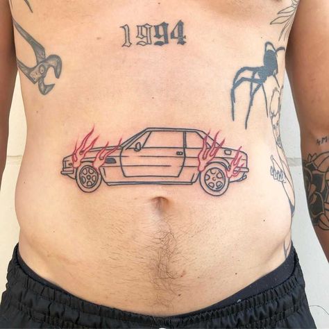 Burning car tattoo inked on the belly by Hand Job Tattoo Car On Fire Tattoo, Car Enthusiast Tattoo, F1 Tattoo, Job Tattoo, Twenty One Pilots Tattoo, Burning Car, Pilot Tattoo, Twenty On Pilots, Related Tattoos