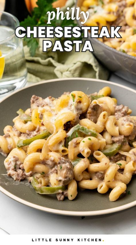 This easy one-skillet Philly Cheesesteak Pasta is just like the best cheesesteak sandwich you've ever had, in cheesy, creamy pasta form! Philly Cheese Steak Pasta Ground Beef, Pasta With Steak Recipes, Philly Cheese Steak Pasta, Daycare Recipes, Philly Cheesesteak Pasta, Cheesesteak Pasta, Chicken Philly Cheesesteak, Roasted Broccoli And Carrots, Supper Meals