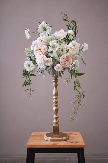 Wedding Ideas for Stunning Tall Centerpieces Gold Candlestick Centerpiece, Candlestick Arrangements, Candlestick Centerpiece, Table Flower Arrangements, Gold Candle Sticks, Gold Wedding Decorations, Tall Centerpieces, Wedding Table Flowers, Gold Diy