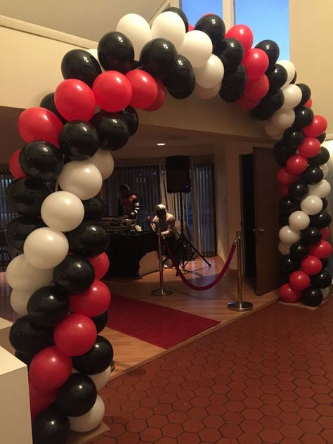 Super red, black and white spiral balloon arch. We could also carry black and red balloons to the greek theatre Red And Black Balloon Arch, Red And Black Party Ideas, Spiral Balloon Arch, Balloon Archway, Black And White Spiral, Black And White Balloons, Deco Ballon, Casino Night Party, Black Balloons