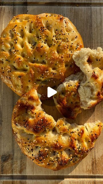 Kim | Home Baker & Digital Creator on Instagram: "super soft sourdough pita recipe ☺️⤵️

Ramadan is almost over but I’ve been seeing so many videos of Turkish Ramadan Pita and had to try it out! So here’s my take on it (this is not authentic). It’s super easy to make, it’s soft & fluffy, and so fun to dimple! Recipe makes 3 pitas

Dough:
480g bread flour
350g water
95g levain (ripe and ready to be used)
45g melted butter
12g salt
1 tbsp honey

Egg yolk topping:
2 yolks
1 tbsp greek yogurt
sesame seeds (EBTB seasoning actually works so well with this)

1. In the morning, combine all dough ingredients except butter until no dry spots remain. Cover and let autolyse for 30mins
2. Add in melted butter. Knead and/or perform slap and folds until it’s incorporated. Dough will be sticky. Place into Sourdough Pita, Pita Recipe, Pita Recipes, Dough Ingredients, Digital Creator, Bread Flour, Egg Yolk, Sesame Seeds, Greek Yogurt