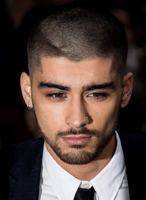 And debuted his shaved head. | So, Zayn Malik Has Bright Green Hair Now Hairstyles Zayn, Zayn Malik Hairstyle, Dancing Pose, One Direction Music, Zayn Malik Photos, Facial Aesthetics, Eyebrow Piercing, Shaved Head, Buzz Cut