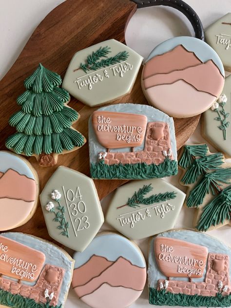 #sugarcookies #outdoortheme #hikingtheme #wildernesstheme #adventureawaits #nationalparkscookies Mountain Cookies Decorated Wedding, Mountain Theme Cookies Decorated, Last Trail Before The Veil Cookies, Mountain Cookies Royal Icing, Outdoor Themed Cookies, Adventure Cookies Decorated, Hiking Cookies Decorated, Colorado Cookies Decorated, Mountain Themed Cookies