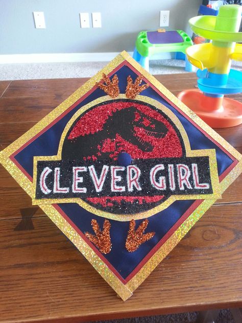 Jurassic Park Graduation Cap Jurassic Park Poster, Cute Pumpkin Carving, High School Graduation Cap, College Graduation Cap Decoration, Grad Cap Designs, Graduation Picture Poses, Graduation Cap Designs, Graduation Hat, Graduation Cap Decoration