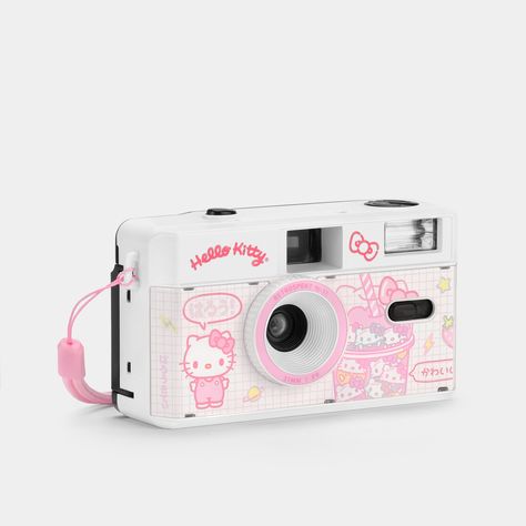 Smooth and sweet like a strawberry milkshake — this delectable film camera is Hello Kitty at her most scrumptious. Created by Retrospekt and Sanrio exclusively for their newest collection of retro tech products, every piece from the Strawberry Kawaii series features a clean white and pink palette with official Hello Kitty artwork and includes phrases such as “Hello Kitty” and “Kawaii” set in Japanese hiragana characters. With a fixed-focus lens and optional flash, this point-and-shoot 35mm camer Strawberry Kawaii, Hello Kitty Strawberry, Kitty Pictures, Retro Tech, Cute Camera, Instant Film Camera, Pink Palette, Tech Products, Dog Dental