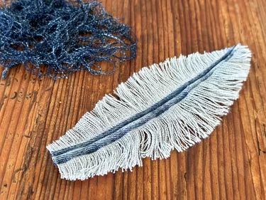 Blue Pumpkin Wreath DIY with Recycled Denim Feathers | ehow Denim Feathers Diy, Jean Feathers, Wreath With Feathers, Denim Feathers, Midnight Blue Paint, Traditional Fall Decor, Leaf Art Diy, Pumpkin Wreath Diy, Plain Wreaths